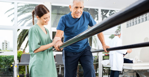 elderly man doing physical therapy